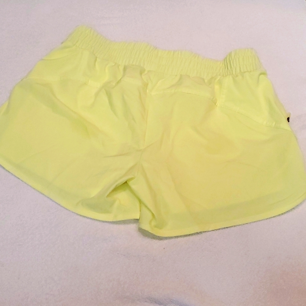 Neon yellow running shorts small